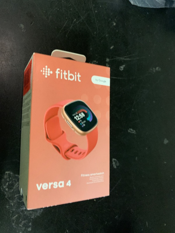 Photo 1 of Fitbit Versa 4 Smartwatch - Pink Sand/Copper Rose