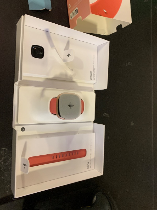 Photo 1 of Fitbit Versa 4 Smartwatch - Pink Sand/Copper Rose