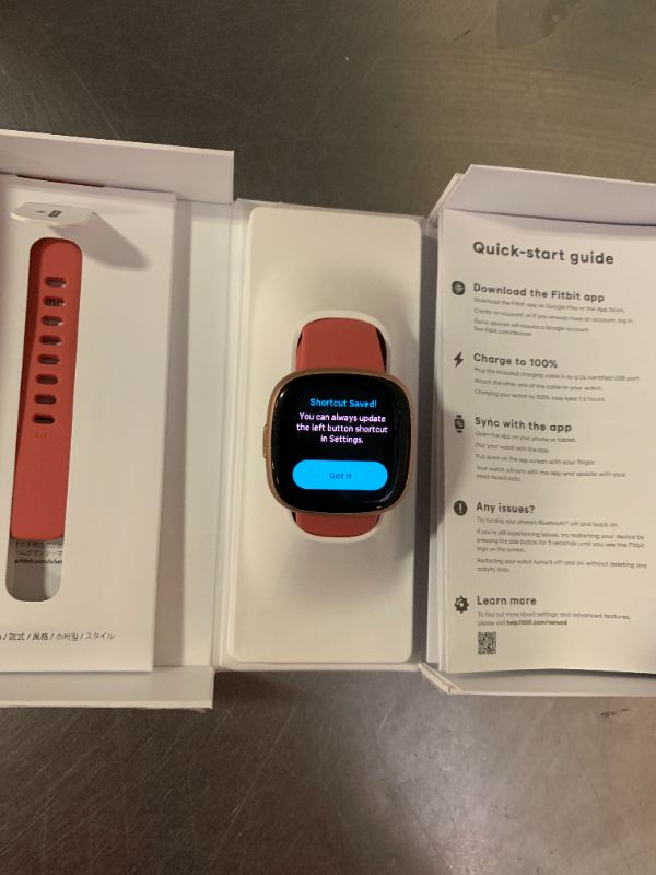 Photo 1 of Fitbit Versa 4 Smartwatch - Pink Sand/Copper Rose