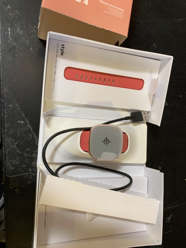 Photo 1 of Fitbit Versa 4 Smartwatch - Pink Sand/Copper Rose