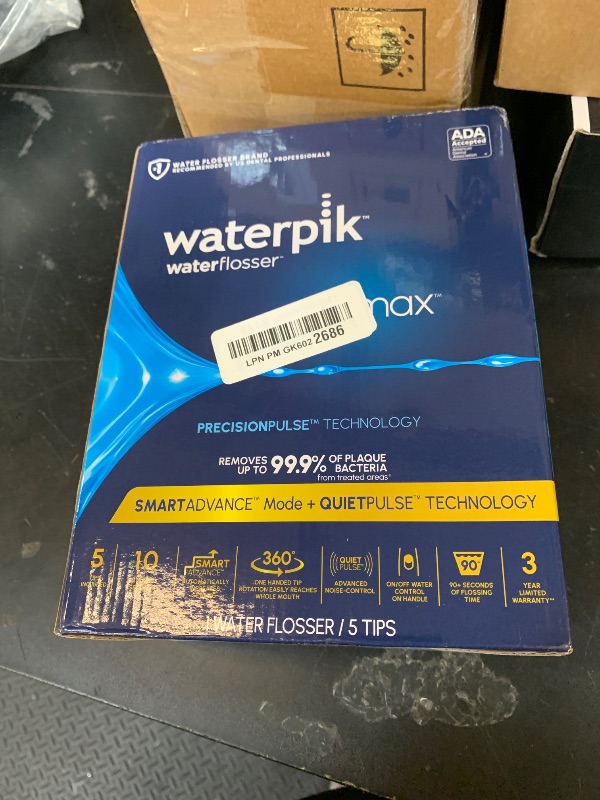 Photo 1 of Waterpik Promax Countertop Water Flosser, SmartAdvance, 10 Settings, 5 Tips