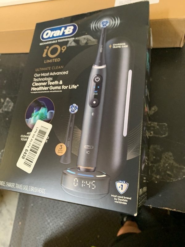 Photo 1 of Oral-B Rechargeable Electric Toothbrush, iO9 Limited Ultimate Clean, 7 Cleaning Modes, Interactive Display, iSense Charger, Charging Travel Case, Visible Pressure Sensor, 3 Brush Heads, Black