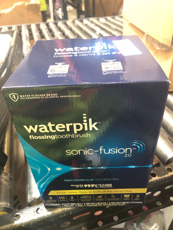 Photo 1 of Waterpik Sonic-Fusion Flossing Electric Toothbrush Water Flosser, White
