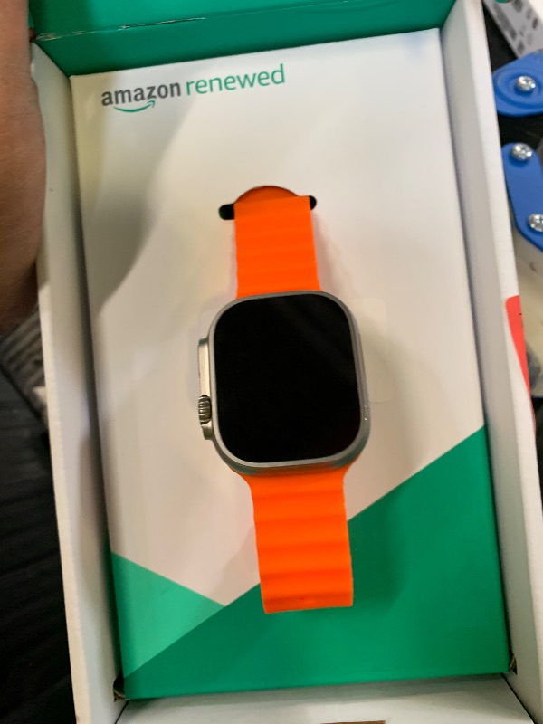 Photo 1 of Apple Watch Ultra 2 [GPS + Cellular, 49mm] - Rugged Titanium Case with Orange Ocean Band, One Size (Renewed Premium)