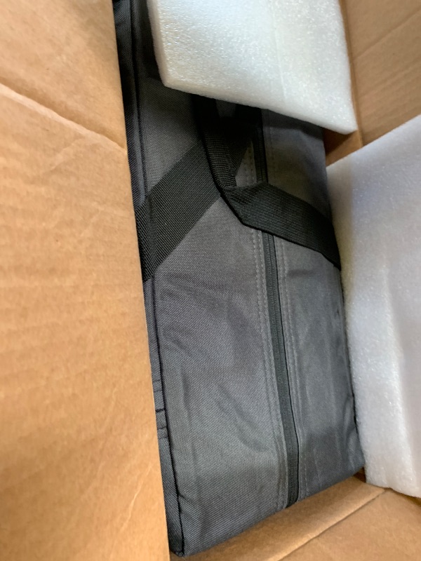 Photo 1 of Guava Family Travel Crib with Mattress and Backpack