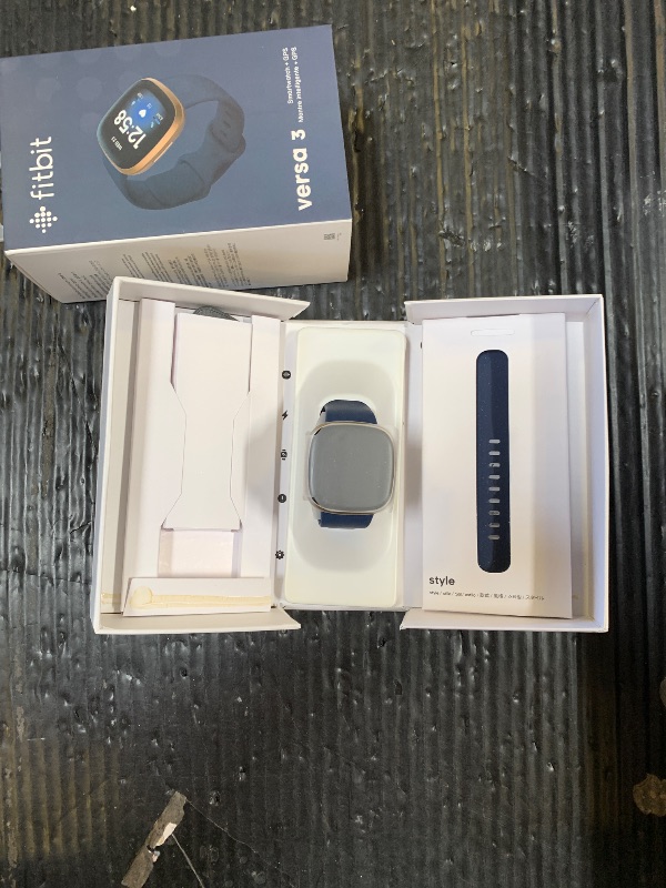 Photo 1 of Fitbit Versa 3 Health & Fitness Smarwtach with GPS, 24/7 Heart Rate, 6+ Days Battery, Midnight Blue/Gold, One Size (S & L Bands Included)