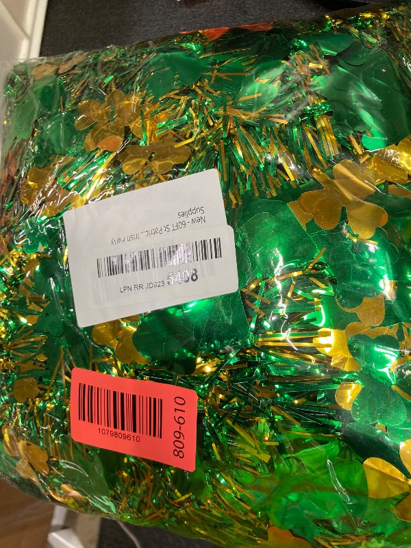 Photo 1 of ?20/40/60/80 FT? St Patricks Day Garland Decor Gold Green Shamrock Hat Tinsel Garland, Shiny Metallic Streamer Twist Garland Hanging St Patricks Day Decorations for Home Indoor Outdoor Party Supplies