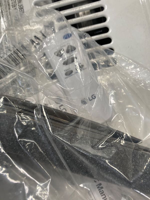 Photo 1 of ***DAMAGED -SELLING AS PARTS ONLY*** 

LG 6000 BTU Window Air Conditioner[2024 New] Remote Control, WiFi Enabled works with LG ThinQ, Alexa, Hey Google, Washable Filer Ultra-Quiet Cools Small Room up to 250 Sq.Ft AC Unit White LW6024RSMX
