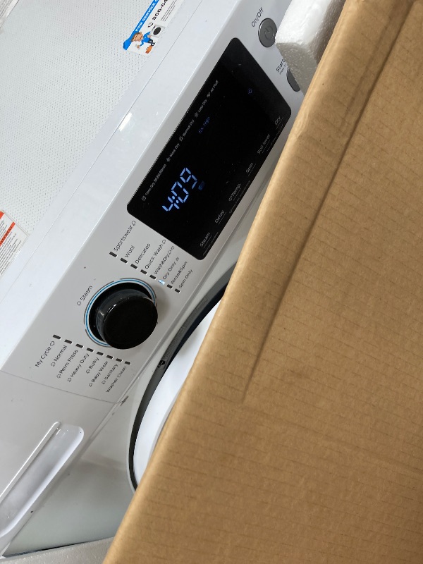 Photo 1 of **It turned on**
*****Midea 24 Inch All-in-One Front Load Washer Dryer Combo, 2.7 Cu.ft 26lbs Ventless Full-Automatic Washing Machine with Steam Care, Overnight Dry, 1400 RPM 16 Wash Cycles, White