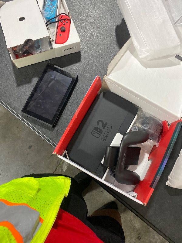 Photo 1 of -PLEASE READ ENTIRE DESCRIPTION BEFORE BIDDING!!!!!!!!!!!!!!!!!!!!!!!!!!!!!!!!!!!!!!!!!!!!!!!!!!!! -Nintendo Switch System. Item is in switch 2 box and has switch 2 accessories but tablet is not a switch 2 !