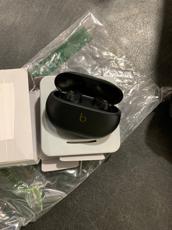 Photo 1 of Beats Studio Buds + | True Wireless Noise Cancelling Earbuds, Enhanced Apple & Android Compatibility, Built-in Microphone, Sweat Resistant Bluetooth Headphones, Spatial Audio - Black/Gold