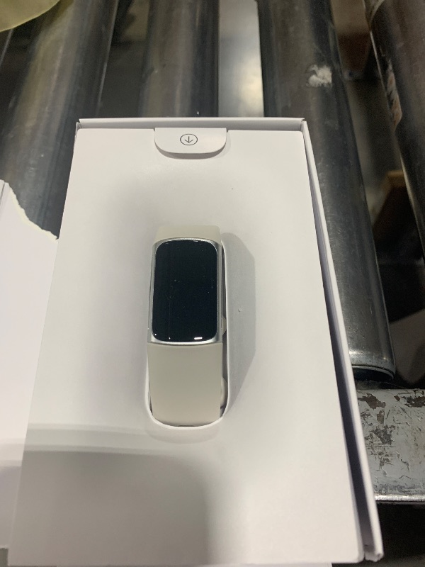 Photo 1 of Fitbit Charge 6 Fitness Tracker with Google Apps - Heart Rate on Exercise Equipment - 3-Month Google Health Premium Membership Included - Health Tools - Porcelain/Silver - Small&Large Bands Included