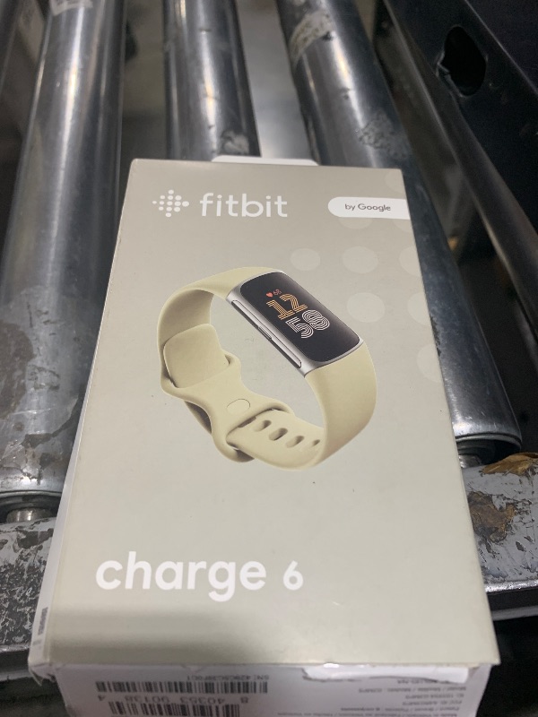 Photo 1 of Fitbit Charge 6 Fitness Tracker with Google Apps - Heart Rate on Exercise Equipment - 3-Month Google Health Premium Membership Included - Health Tools - Porcelain/Silver - Small&Large Bands Included
