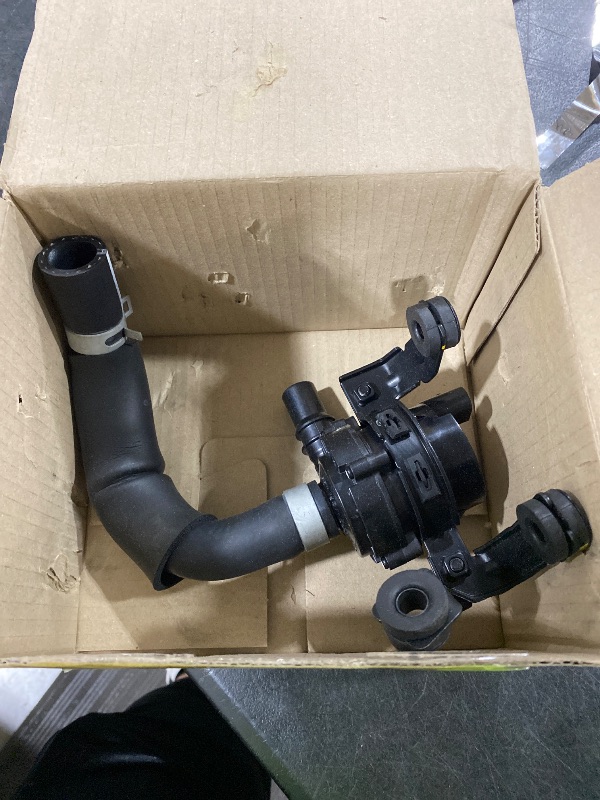 Photo 1 of Genuine Hyundai (97310-4R000) Water Pump And Hose Assembly