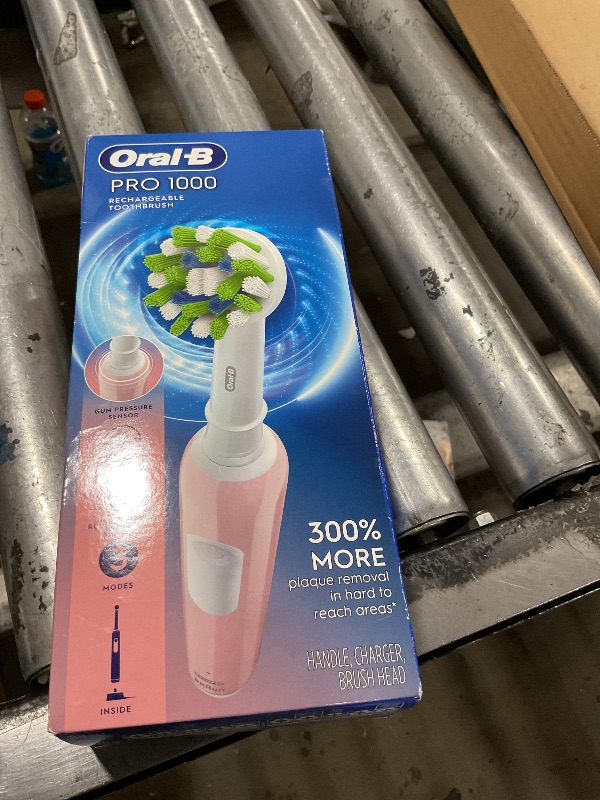 Photo 1 of Oral-B Pro 1000 Rechargeable Electric Toothbrush, Pink
