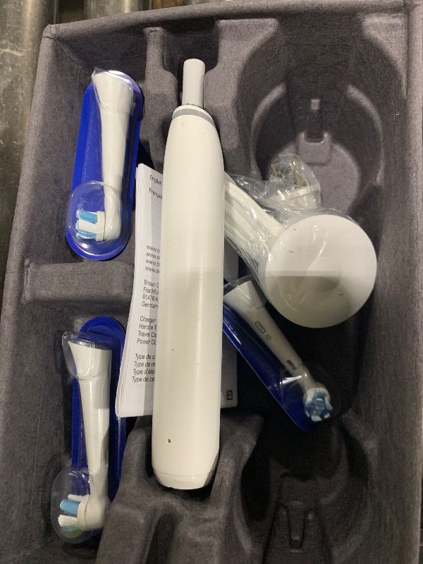 View 3 of Oral-B iO Series 8 Electric Toothbrush with 2 Replacement Brush Heads and Travel Case, Rechargeable Toothbrush, Whitealabaster