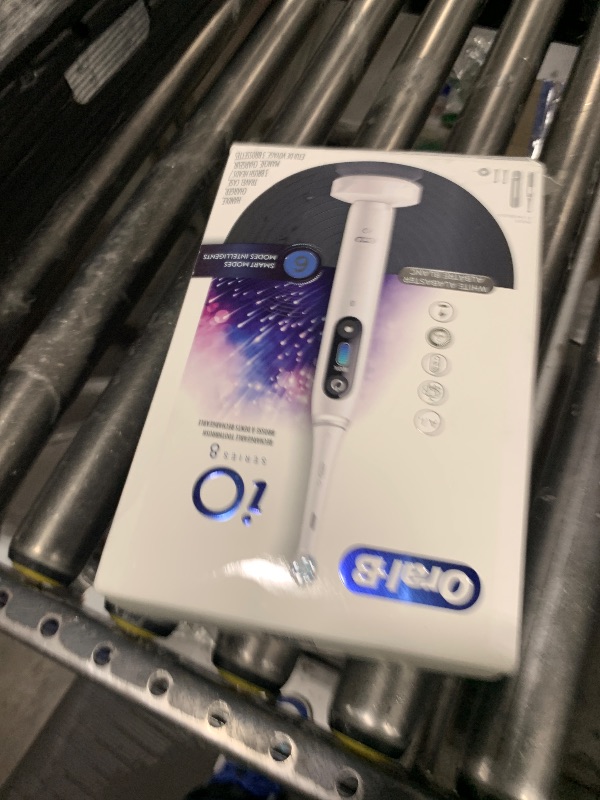 View 2 of Oral-B iO Series 8 Electric Toothbrush with 2 Replacement Brush Heads and Travel Case, Rechargeable Toothbrush, Whitealabaster