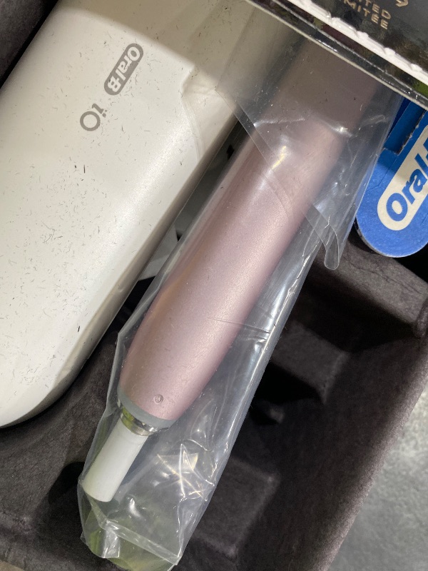 Photo 1 of Oral-B Rechargeable Electric Toothbrush, iO9 Limited Ultimate Clean, 7 Cleaning Modes, Interactive Display, iSense Charger, Charging Travel Case, Visible Pressure Sensor, 3 Brush Heads, Rose Quartz