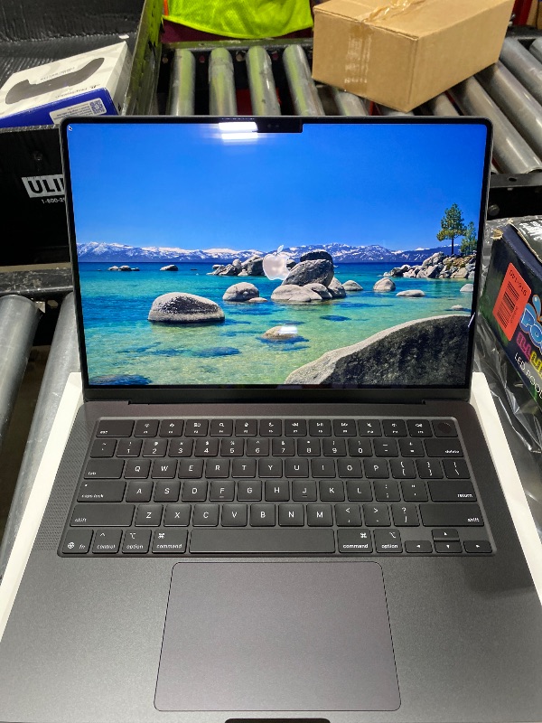 Photo 1 of Black/Grey Macbook pro 14in