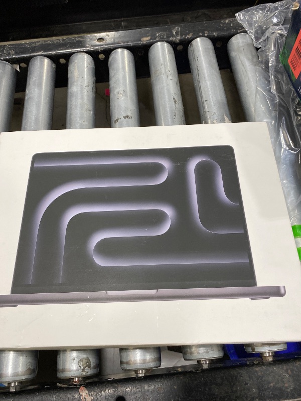 Photo 1 of Black/Grey Macbook pro 14in
