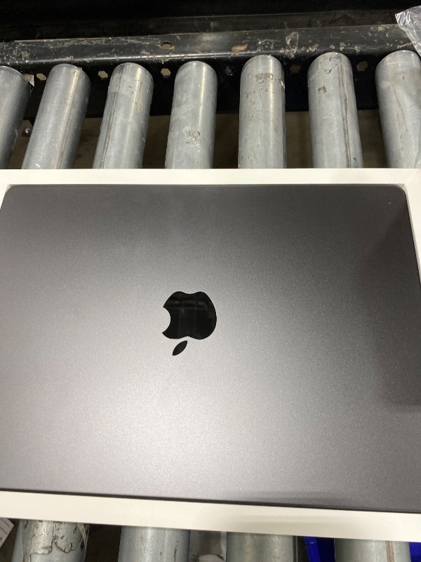 Photo 1 of Black/Grey Macbook pro 14in