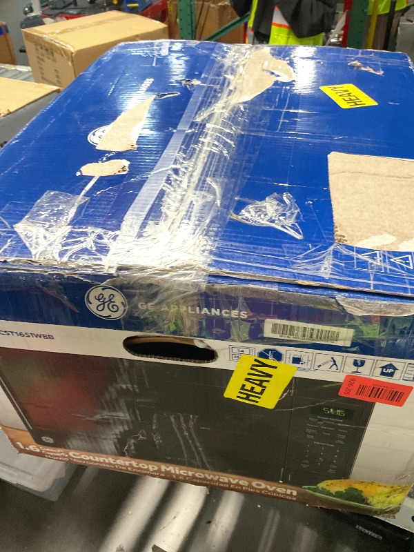 Photo 1 of ***SOLD FOR PARTS***GE GCST16S1WBB Microwave Oven, 1,150-watt 8 Auto Cooking Settings, Child-Lock Technology, Kitchen Essentials for The Countertop, Dorm Room or Apartment, 1.6 Cu. Ft, Black