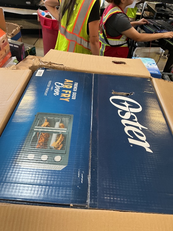Photo 1 of MAJOR DAMAGE--------------------SELLING FOR PARTS ONLY--------------------------------------Oster Extra-Large 42L French Door Countertop Toaster Oven, 6-in-1 Air Fryer Oven with Air Fry Rack, Wire Rack, Baking Pan and Crumb Tray, Stainless Steel