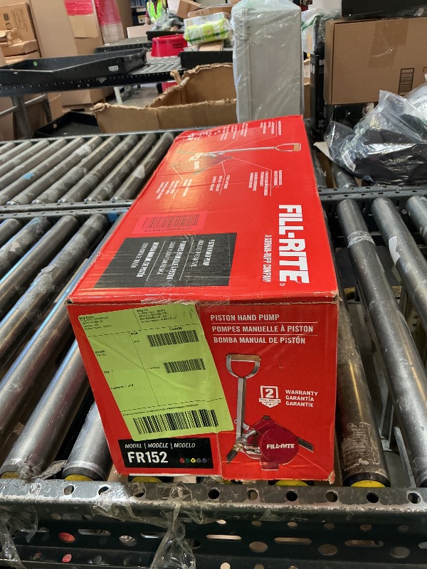 Photo 1 of Fill-Rite FR152 Piston Hand Pump with Hose & Nozzle Spout, Red