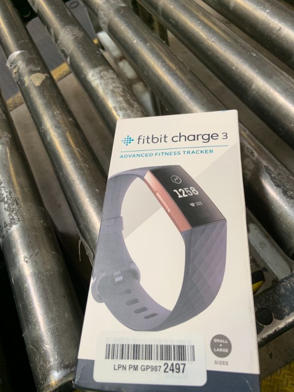 Photo 1 of Fitbit Charge 3 Fitness Activity Tracker, Rose Gold/Blue Grey, One Size (S and L Bands Included)
