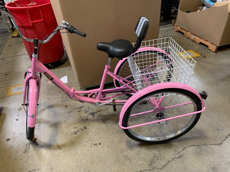 Photo 1 of pink tricycle bike
Bent back tire