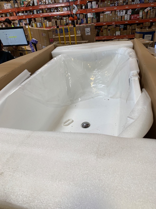 Photo 1 of Freestanding Bathtub 67 inch Extra Large Freestanding Bathtub – Modern Oval Freestanding Tub with Chrome Drain & Overflow for Home Spa or Bathroom Relaxation