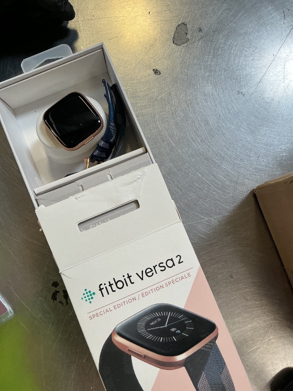 Photo 1 of Fitbit Versa 2 Special Edition Health and Fitness Smart Watch with Heart Rate, Music, Alexa Built-In, Sleep and Swim Tracking, Navy and Pink Woven/Copper Rose, One Size (S and L Bands Included), 2.3