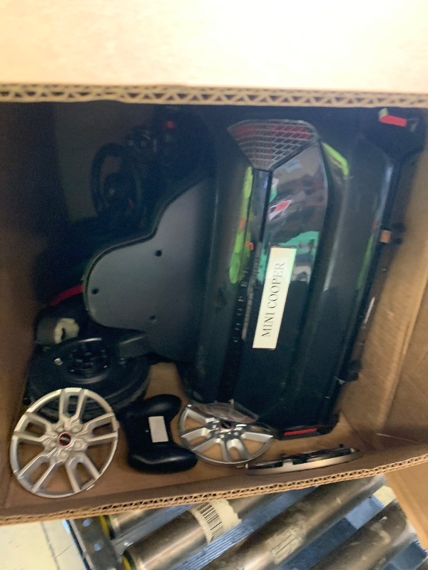 Photo 1 of 12V BMW Mini Cooper Licensed Ride on Car, Electric Ride on Toy?Powered by 4.5Ah Battery, Includes Positive Energy Charger, Wheels, Remote Control with Factory-Paired Code