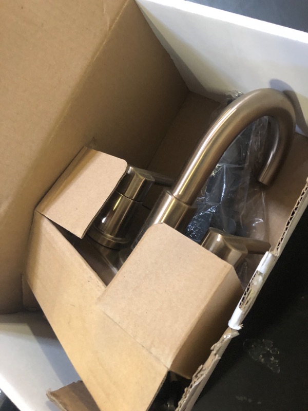 View 2 of Delta Nicoli Centerset Brushed Gold Bathroom Faucet with Sprayer, 4 Inch 3 Hole Bathroom Sink Faucet with Pull Out Sprayer, Push-Pop Drain, Champagne Bronze 25749LF-CZ