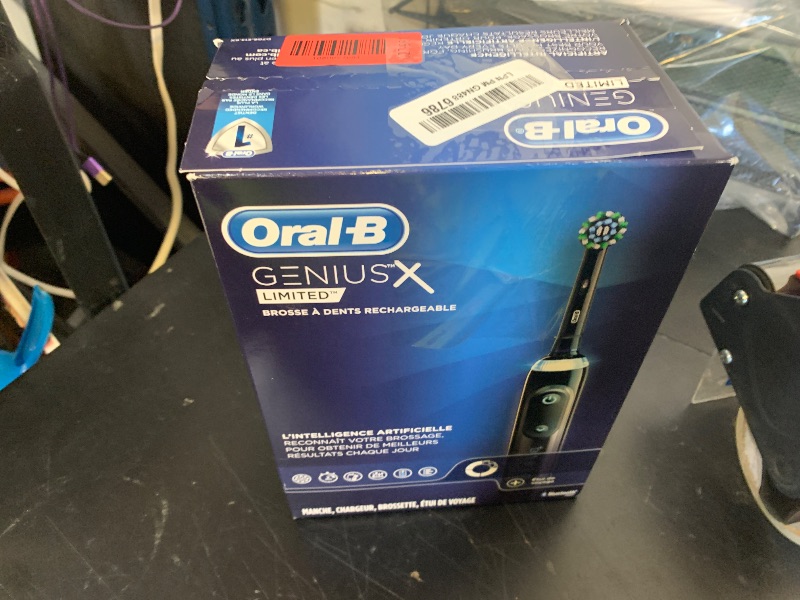 Photo 1 of Oral-B Genius X Limited Rechargeable Electric Toothbrush with 1 Replacement Brush Head, Travel Case, Midnight Black