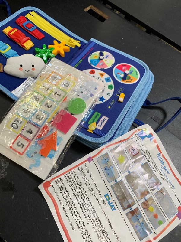Photo 1 of Toddlers Busy Board, Montessori Sensory Activity Board with Fine Motor Skills Learning Toys, Travel Toy for Airplane and Car, Educational Gift for Boys and Girls