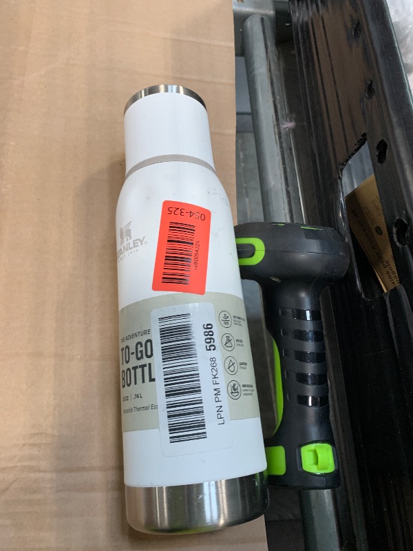 Photo 1 of **** HAS SMALL DENT  *** Stanley Adventure-To-Go Vacuum Bottle 25 oz | Wide Mouth with Leakproof Cup Lid | Keep Drinks Hot or Cold | Packable for Travel | Insulated Stainless Steel Thermal Bottle | BPA-Free | Frost White
