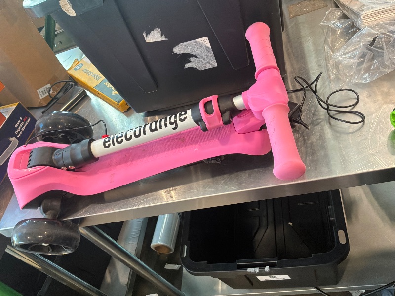 Photo 1 of [Lights don’t function] Elecorange 3 Wheel Electric Scooter for Kids, Long Range, Extra Wide Flashing Deck & Wheels, Electric Scooter for Kids Ages 6-12, Adjustable Handlebar, Folding Lightweight Kick Scooter for Girls, Pink