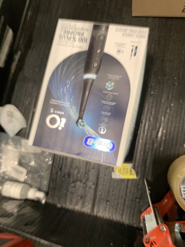 Photo 1 of !!!MISSING PARTS!!!!!!!!!!!Oral-B Rechargeable Electric Toothbrush, iO5 Customizable Clean, 5 Cleaning Modes, Visual Pressure Sensor to Protect Gums, Travel Case, Black