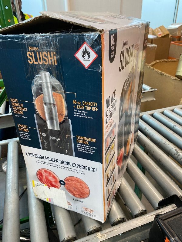 Photo 1 of [UNTESTED] [LEAK PRESENT] [CLERK NOTES]  Ninja SLUSHi Frozen Drink & Slushie Machine with RapidChill Technology | 88 oz. Easy Fill Vessel | 5 Preset Programs | Make Margaritas, Frappés, & More | With Dishwasher Safe Parts | Black | FS301