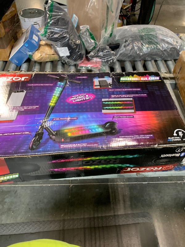 Photo 1 of ****CHECKED 7/11 - AS IS/NO RETURNS - SALE FINAL - FOR PARTS ONLY****Razor Sonic Glow Black Electric Scooter with LED Lights and Bluetooth Wireless Speaker,