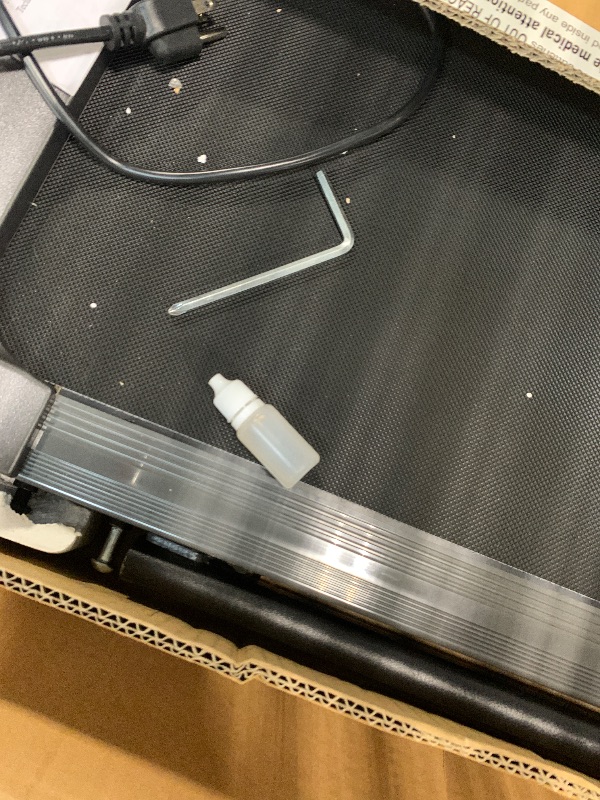 Photo 1 of ***BROKEN, SOLD FOR PARTS*** 
Fitvids Treadmill Under Desk Walking pad with Incline, Walking Treadmill with Handle bar, Treadmills for Home Small with Remote Control, Pre-Assembled,Silvery