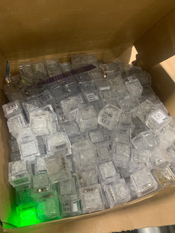 Photo 1 of *** batteries dead*** Ice Cubes, 300 Pack Multi Color Led Ice Cubes for Drinks IP67 Waterproof Reusable Glowing Flashing Changing Lights Water Activated Drink Lights for Cocktails Christmas Party Bar Wedding