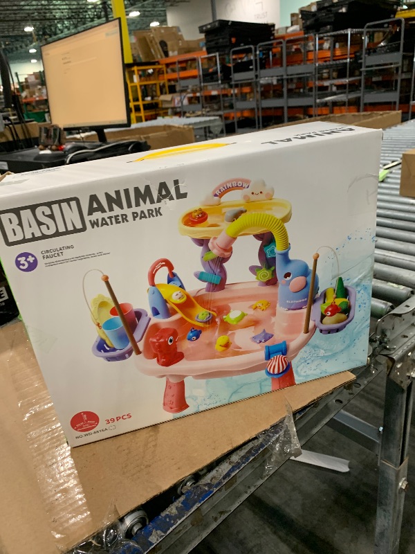 Photo 1 of ** MISSING LEG AND NOT FUNCCTIONAL** *** 8/8 SOLD AS PARTS// FINAL SALE*** Lorveina 2027 Upgraded 4-in-1 Sand Water Table for Toddlers 1-3, Kids Sensory Table with Electric Water Pump & Elephant Faucet, Play Kitchen Sink with Food Accessories, Fishing Toy