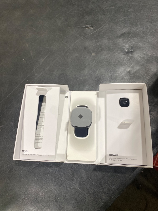 Photo 1 of Fitbit Versa 4 Smartwatch - Black/Graphite