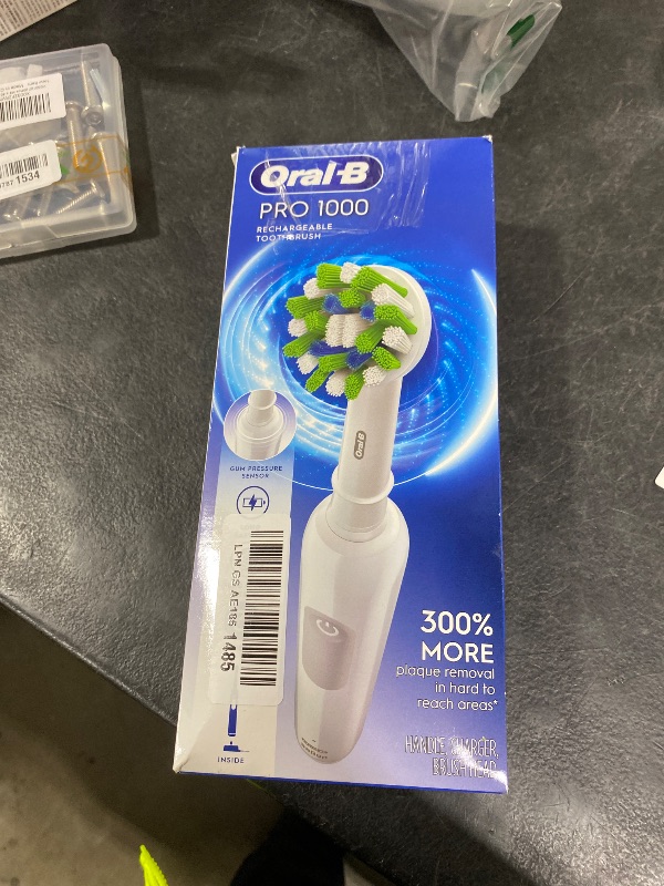 Photo 1 of Oral-B Pro 1000 Rechargeable Electric Toothbrush, White
