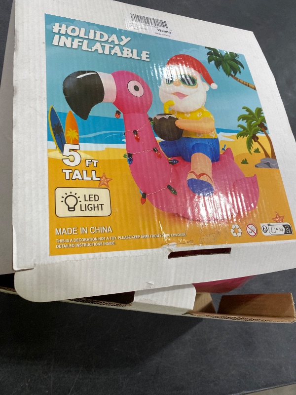 Photo 1 of Christmas in July Hawaiian Santa Claus Riding Flamingo Inflatable Decoration 5FT Tropical Summer Beach Party Decor Blow up Outdoor Yard Garden Lawn Pool Xmas Holiday