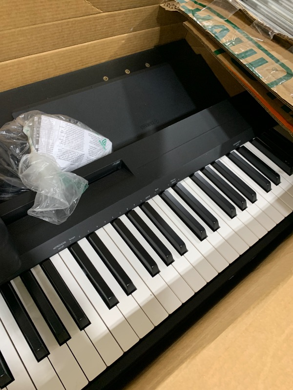 Photo 1 of Yamaha P-143 Digital Piano Bundle, Includes 88-Key Weighted Musical Keyboard, Stand, Bench, Music Rest, and Sustain Foot Switch (P143LXB)