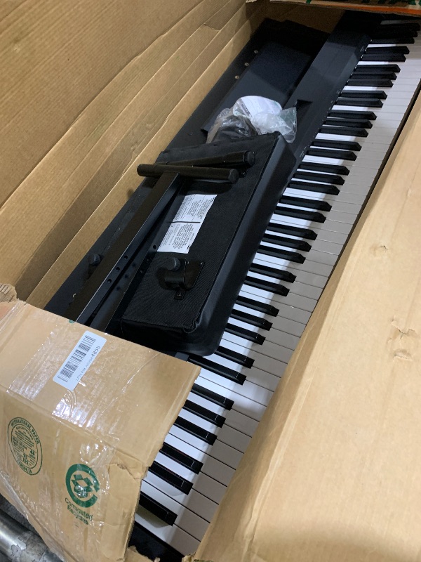 Photo 1 of Yamaha P-143 Digital Piano Bundle, Includes 88-Key Weighted Musical Keyboard, Stand, Bench, Music Rest, and Sustain Foot Switch (P143LXB)