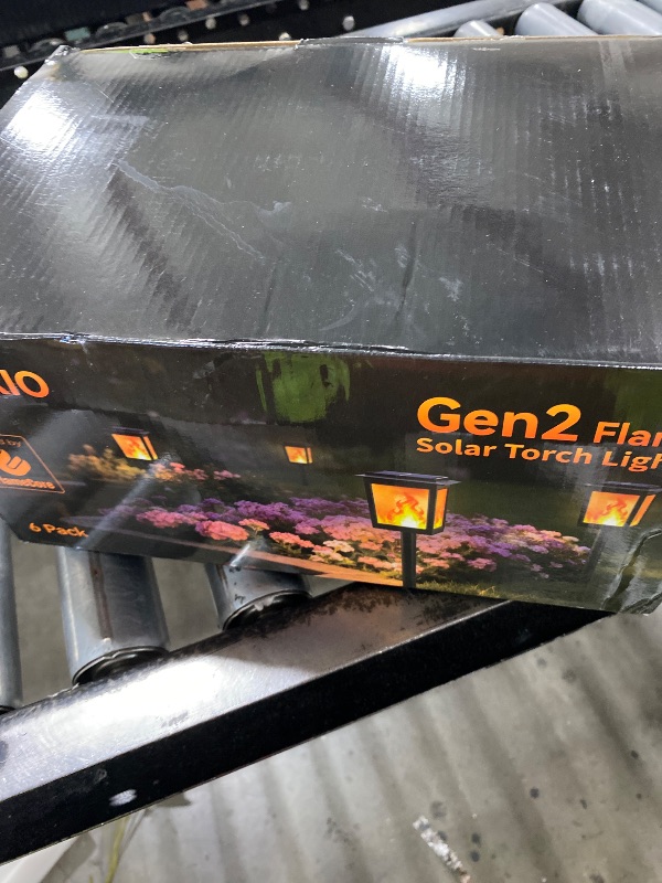 Photo 1 of KYEKIO Large Size & Gen2 Flickering Flame Solar Torch Lights, 6Pack Solar Lights Outdoor Waterproof for Outdoor Decor, Garden Lights Solar Powered, Tiki Torches for Outside Pathway Patio Yard Décor